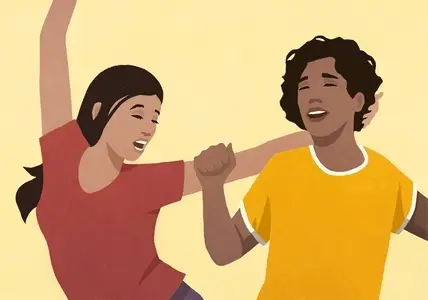 Carefree young women friends dancing against yellow background Carefree young women friends dancing against yellow background