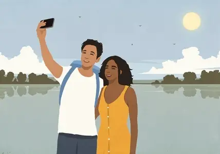 Happy young multiracial couple taking a selfie with smart phone on vacation at sunny summer lake