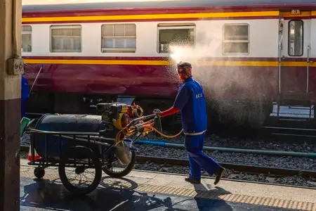 Bangkok  Thailand   March 3  Workers spray water to clean train