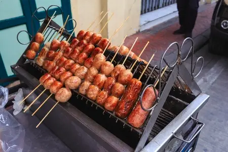 Thailand street food  Grilled Isaan sausages sold on streetsides