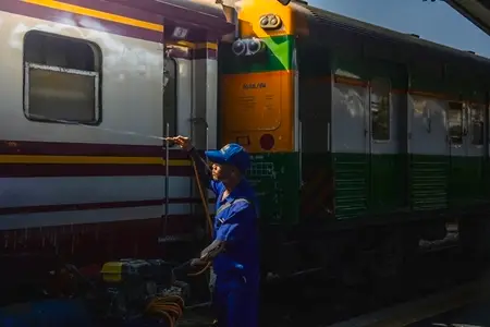 Bangkok  Thailand   March 3  Workers spray water to clean train