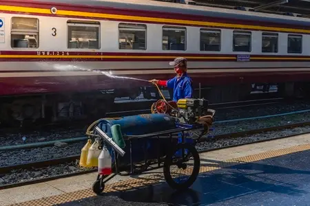 Bangkok  Thailand   March 3  Workers spray water to clean train