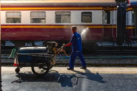 Bangkok  Thailand   March 3  Workers spray water to clean train