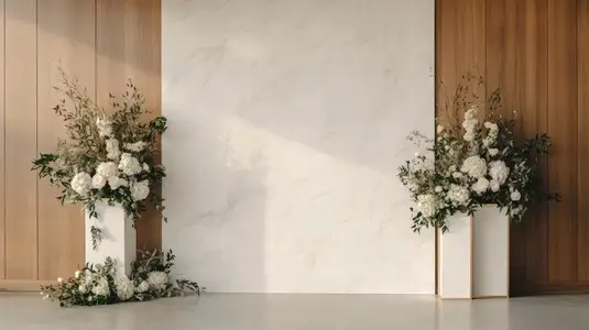 Modern wedding ceremony backdrop with sleek marble panel  wood wall  white floral arrangement
