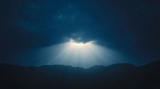 Light  sky  night  mountain  star Dramatic light beams shine through clouds over mountain