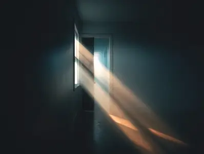 Sunlight shadow empty hallway mysterious moody interior door dramatic light solitude