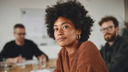 Confident businesswoman teamwork office meeting collaboration professional focus diversity