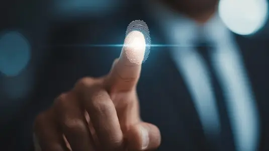 Business professional using biometric fingerprint scanner for secure access  technology concept