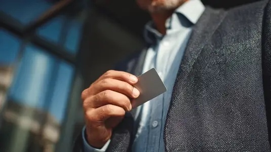 Man suit business executive office access card entry Confident business executive suit holding