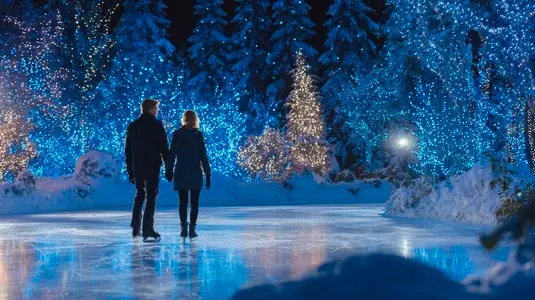 Couple ice skating under Christmas lights  winter forest  romantic  festive  joyful night