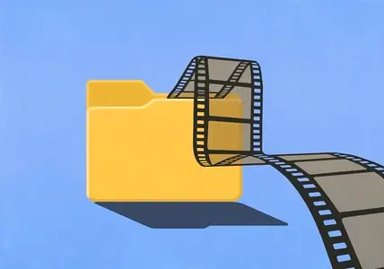 Film negative falling out of digital folder on blue background