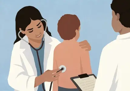 Female pediatrician with stethoscope examining back of boy patient in clinic
