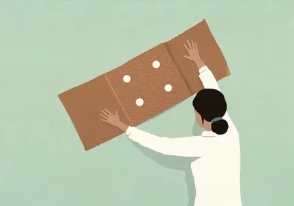 Female doctor placing large bandage over green background