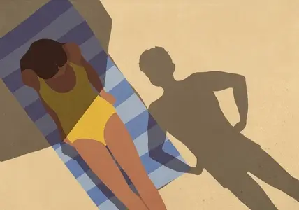 View from above looming shadow of man with hands on hips standing