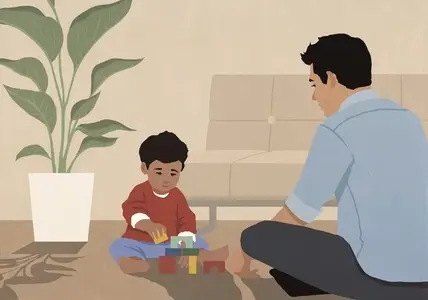 Father and toddler son playing with toys on living room