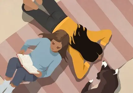 View from above girl reading book on rug by mom and pet dog