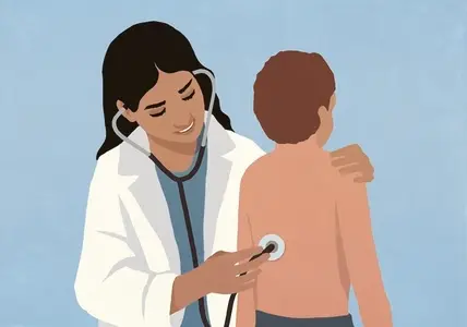 Female pediatrician with stethoscope examining back of boy patient