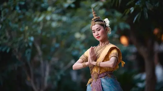 Traditional Thai classical dancer performing gracefully in vibrant costume  showcasing cultural heritage and artistry