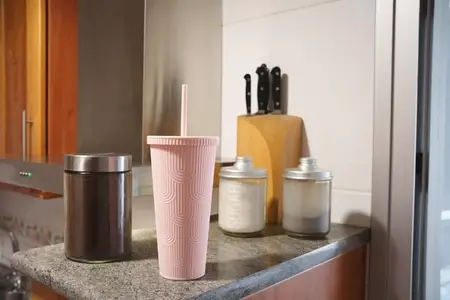Kitchen scene ambiance  Morning breakfast area setting  Cozy kitchen with breakfast essentials displayed  Everyday morning routine captured on kitchen countertop surface