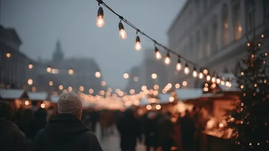 Festive Christmas market illuminated by warm lights creates cozy atmosphere  inviting visitors to explore
