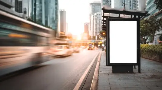 Blank billboard on busy city street with blurred traffic and sunset in background  creating cinematic atmosphere