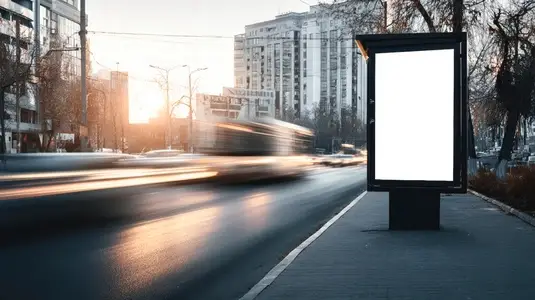Blank billboard on busy city street with motion blur  showcasing urban life and advertising potential