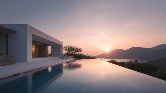 Modern architecture villa with infinity pool at sunset showcasing serene landscape and tranquil atmosphere Modern architecture villa with infinity pool at sunset showcasing serene landscape and tranquil atmosphere