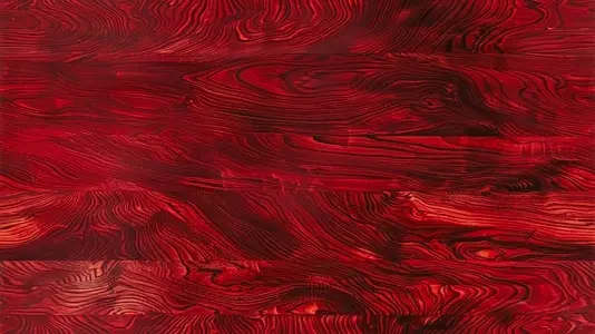 Seamless rich red wood texture with swirling grain patterns